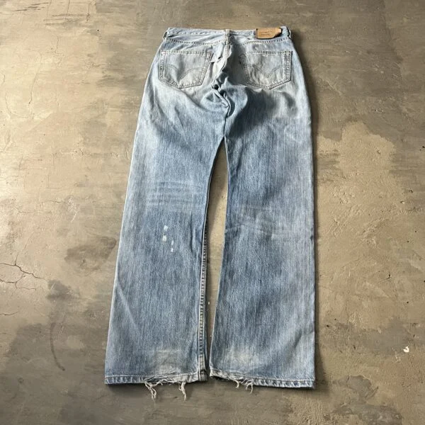 Archive 2000s Levi’s 501 Factory Repaired Jeans w/ Rare Red Pocket Bags