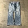 Levi’s 512 Bootcut 2000s Distressed Thrashed Light Wash Raw Hem Jeans