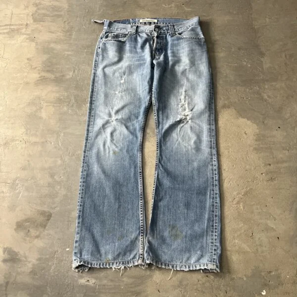 Levi’s 512 Bootcut 2000s Distressed Thrashed Light Wash Raw Hem Jeans