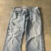 Levi’s 512 Bootcut 2000s Distressed Thrashed Light Wash Raw Hem Jeans