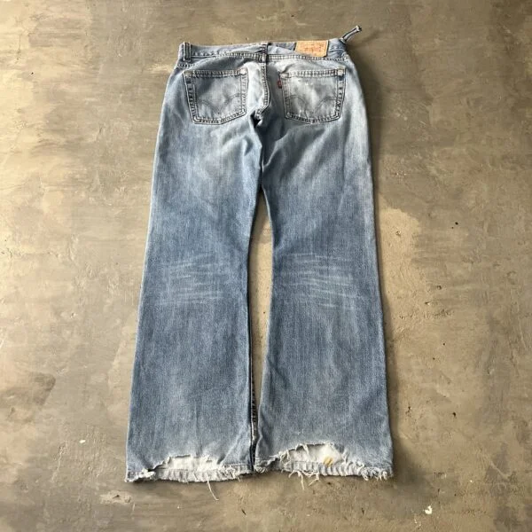 Levi’s 512 Bootcut 2000s Distressed Thrashed Light Wash Raw Hem Jeans