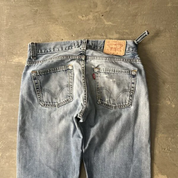 Levi’s 512 Bootcut 2000s Distressed Thrashed Light Wash Raw Hem Jeans