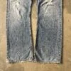 Levi’s 512 Bootcut 2000s Distressed Thrashed Light Wash Raw Hem Jeans